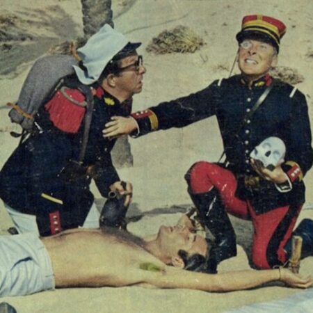 Lobby card for the film Carry On Follow That Camel, featuring Kenneth Williams and Phil Silvers